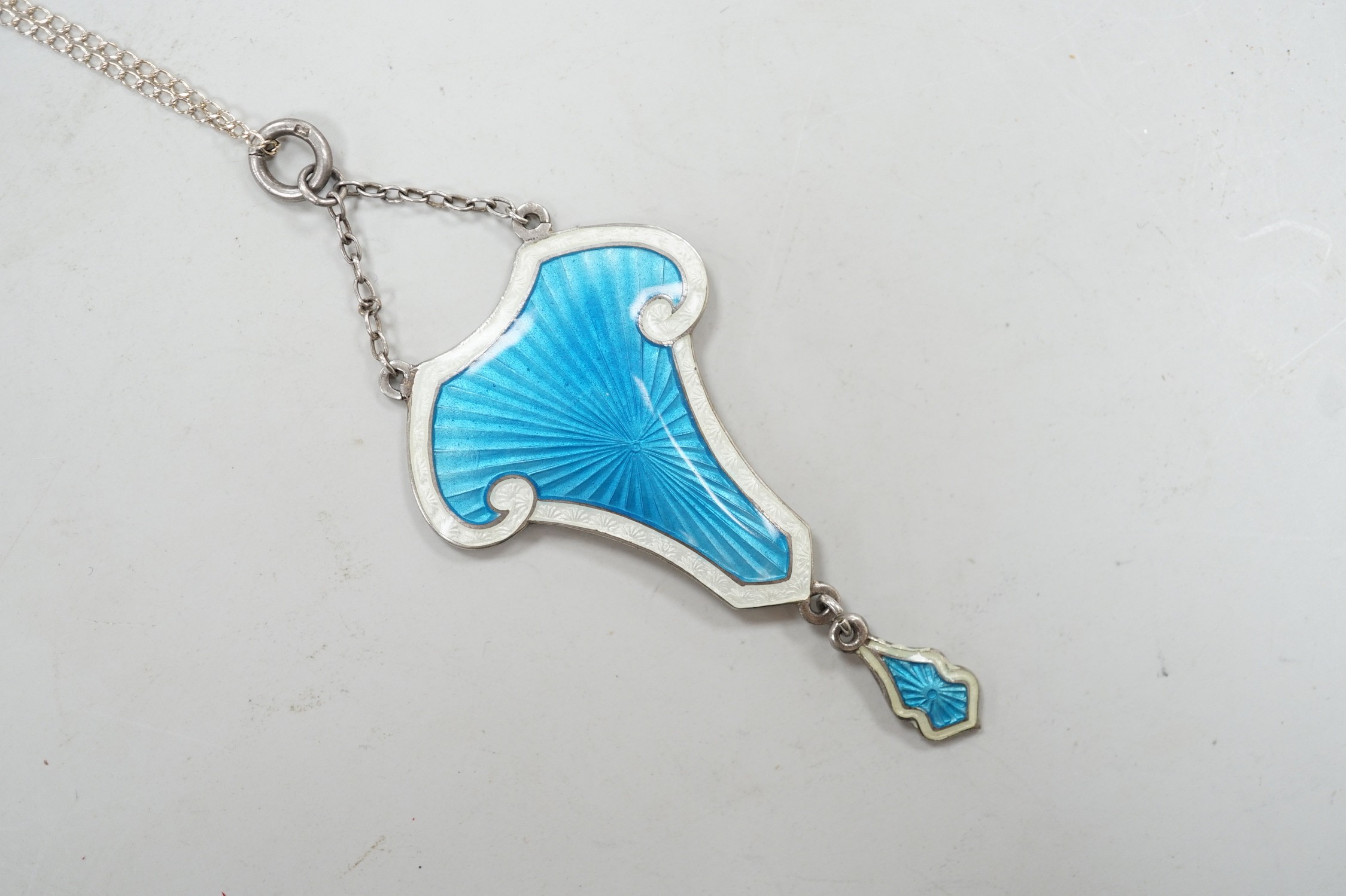 An Edwardian Art Nouveau silver and two colour enamel drop pendant necklace, J. Aitken & Son, Birmingham, 58cm.